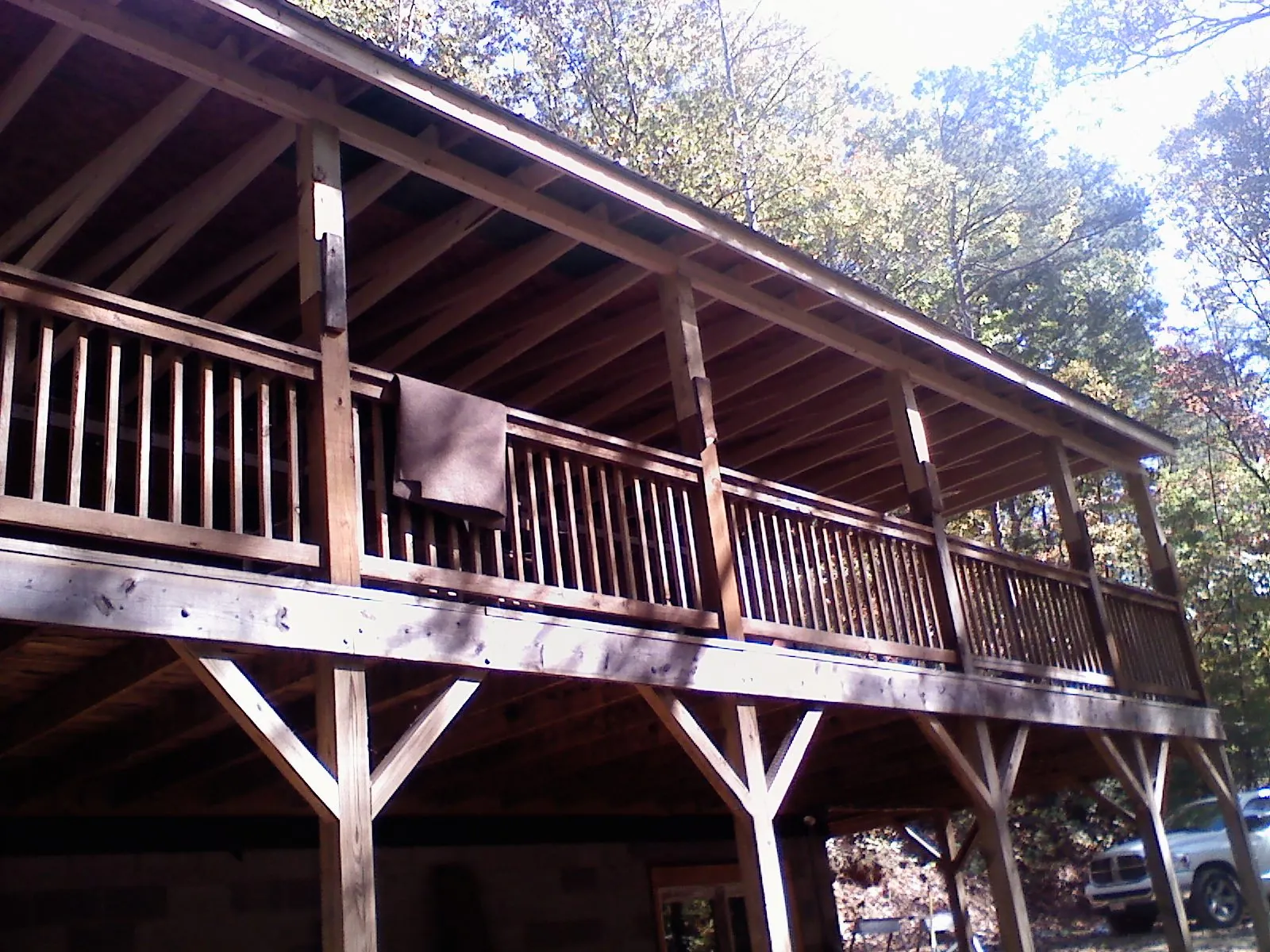 Timber framing under a new elevated porch and deck — Roof Leak Repair in Mechanic Falls by Roofing Brothers